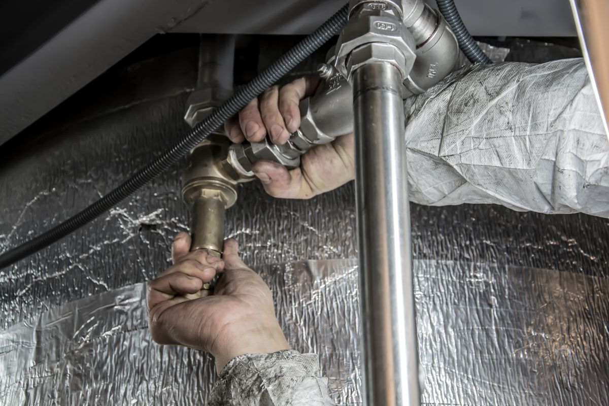 Contractor Insurance Nevada Nevada plumbing contractor at work