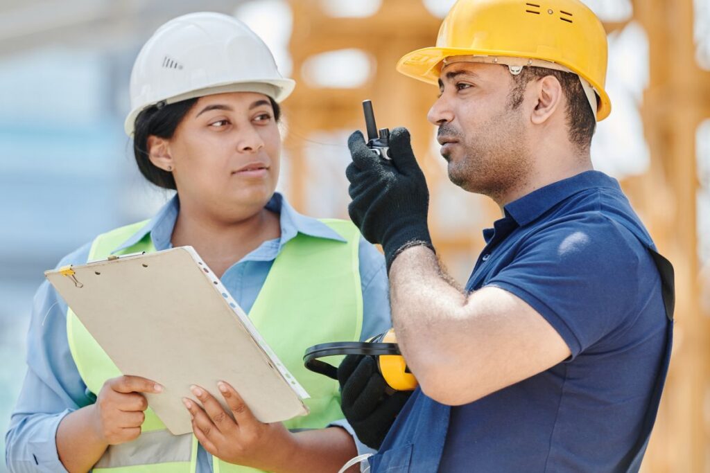 Construction crew wearing hard hats on site